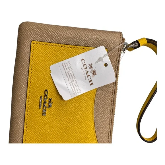 Coach Wristlet Tan NWT and Care Card. - Picture 2 of 4